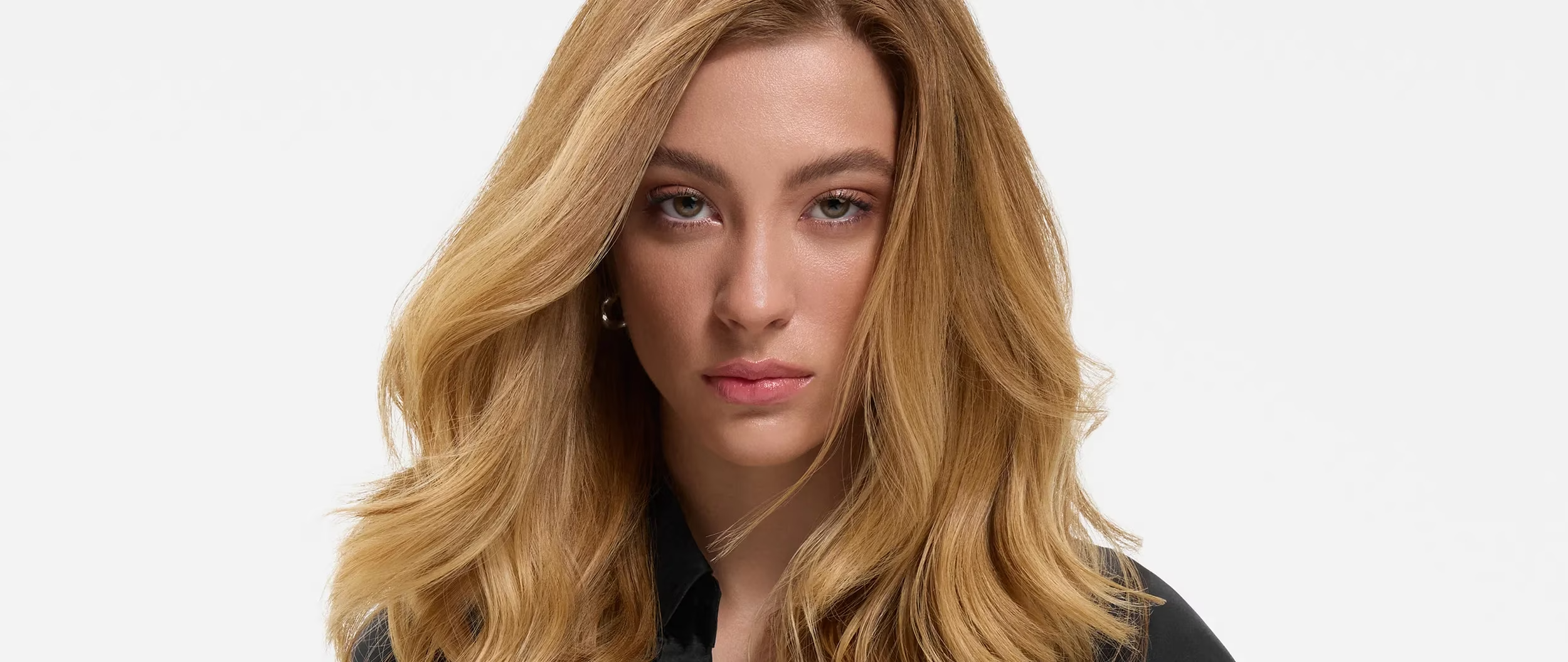 Model with smooth, frizz-free hair after Wella Smoothfiller treatment at Directors Cut Sheffield, a salon alternative to Brazilian Blowdry and Keratin Straightening.